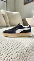 Black puma sneakers